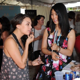 Elise Hamamoto of HydroPeptide helps Janel Parrish glam up.