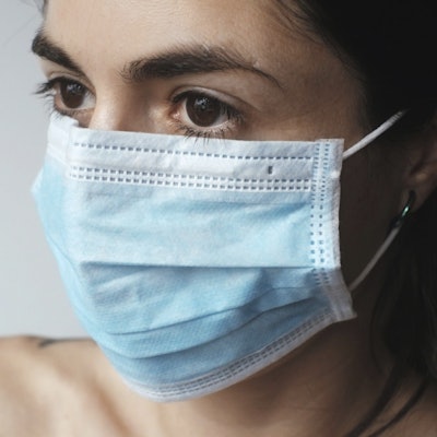Woman In Face Mask