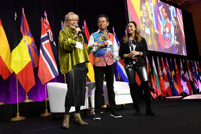 (From left) Katrine Formby, Victor Brick and Lynne Brick announce the creation of the Susie Ellis Scholarship for Equity in Wellness at GWS 2021.