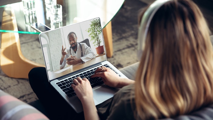 Woman getting doctor's advice in an online therapy session
