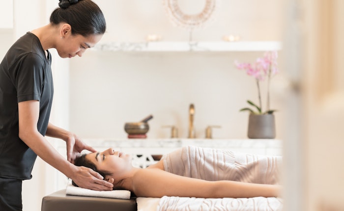 woman lying down getting a spa treatment