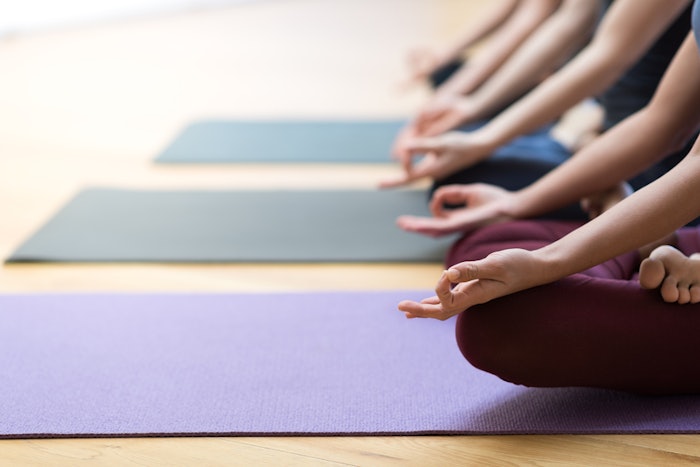 mindfulness and meditation during a yoga class