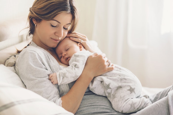 Mom holding her baby