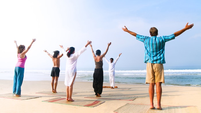 yoga class on the beach