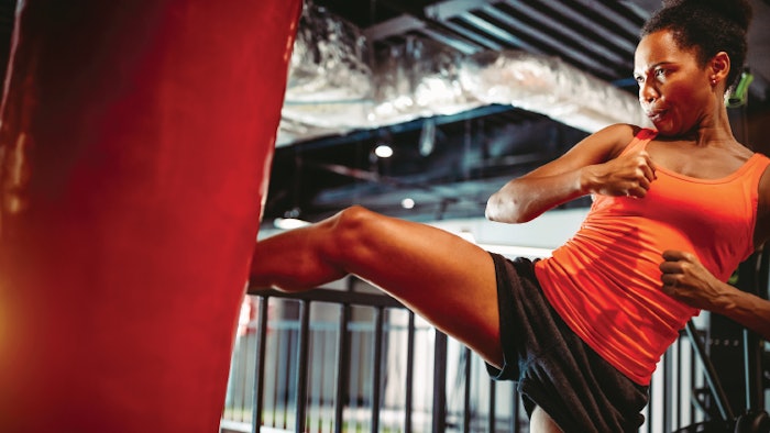 black woman kickboxing