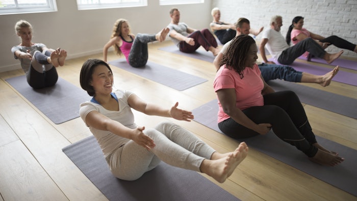 diverse group in yoga class