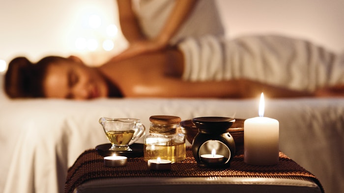 relaxed woman receiving spa treatment
