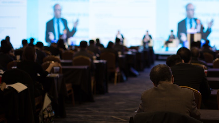 educational panel presentation on a stage