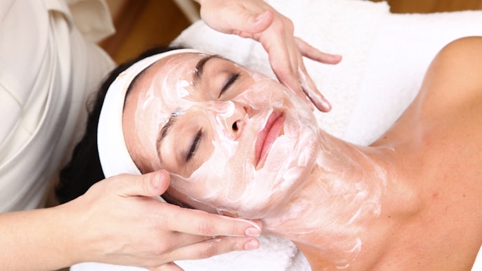 face of women getting a spa treatment